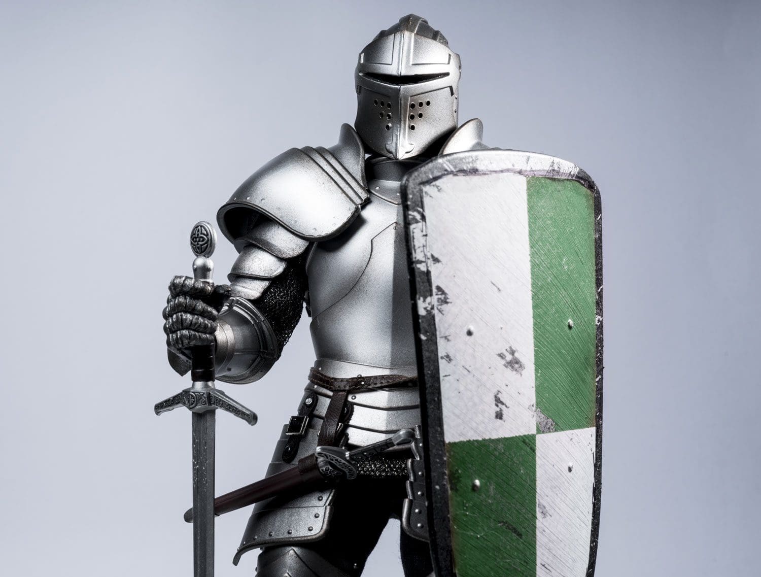 a knight in armor with a shield